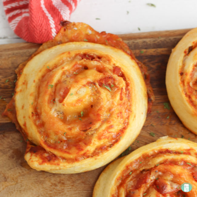 pastry pinwheels with red sauce visible