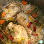 chicken, carrots, peas, green beans, corn, and sliced red peppers in an Instant Pot